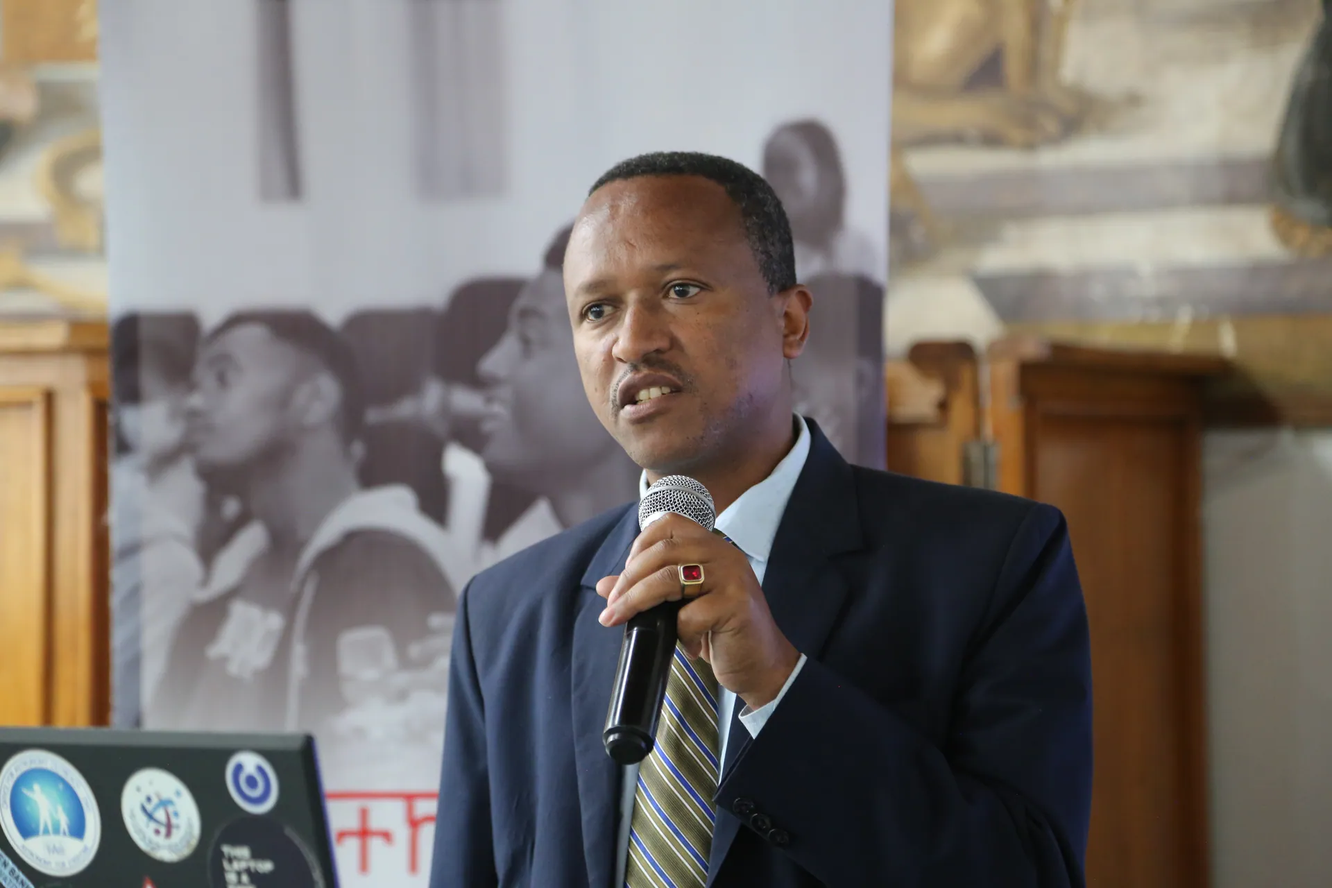 A speaker at the lectern