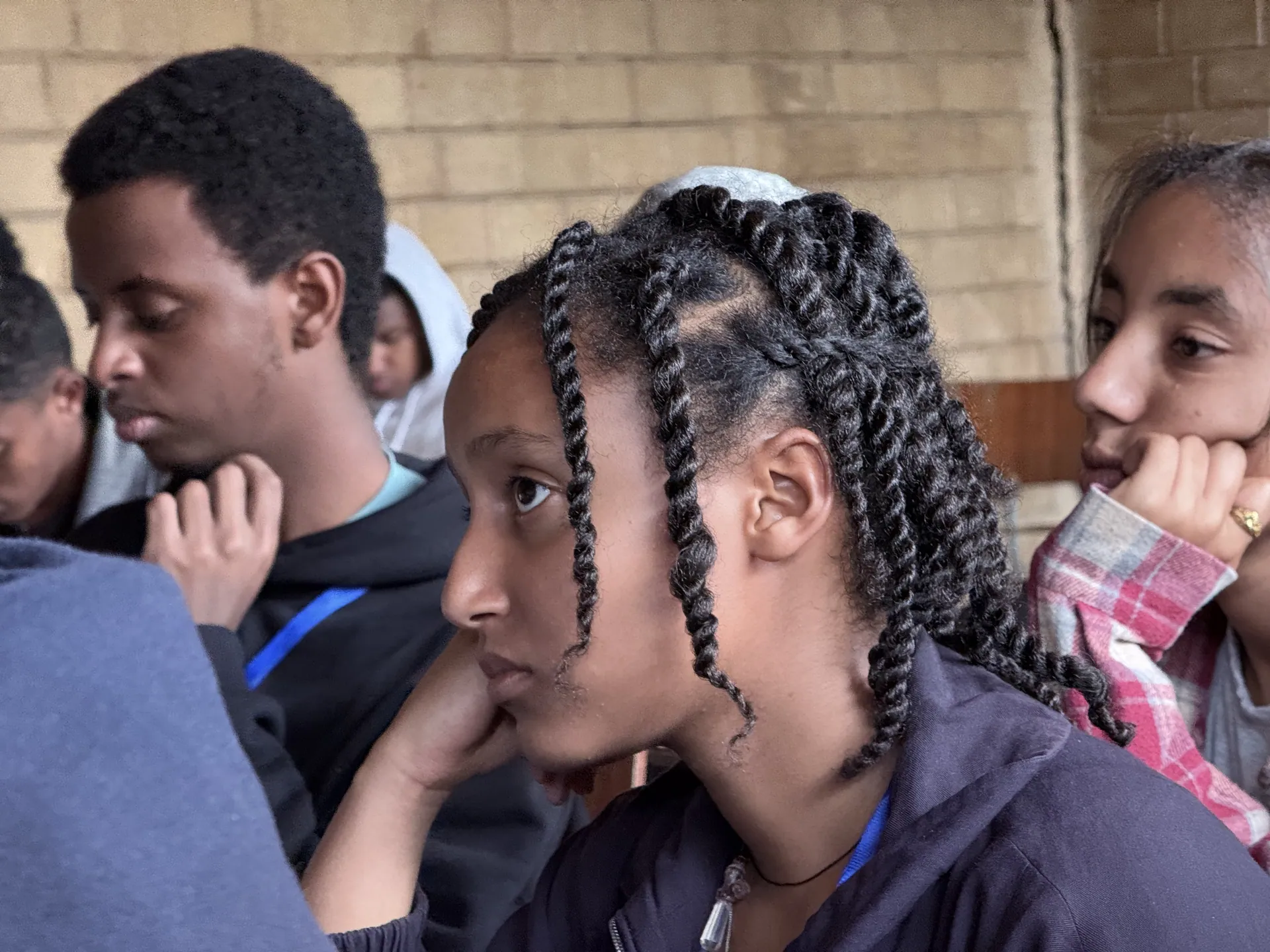 Students listen closely during a session