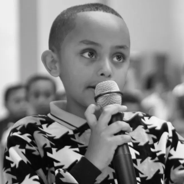 A young ambassador speaking at an ESSS event